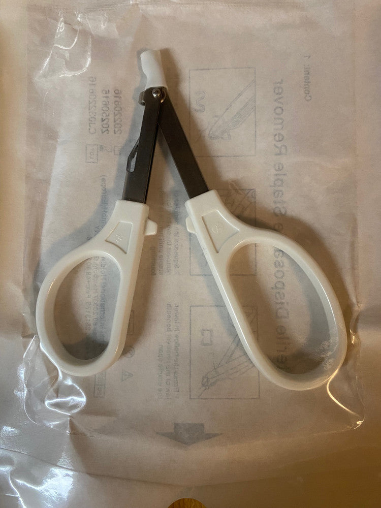 E. SKIN STAPLE REMOVER